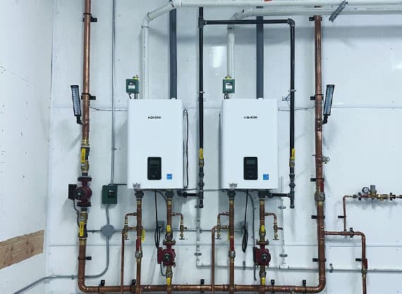 Twin Navien boilers with copper hydronic manifold